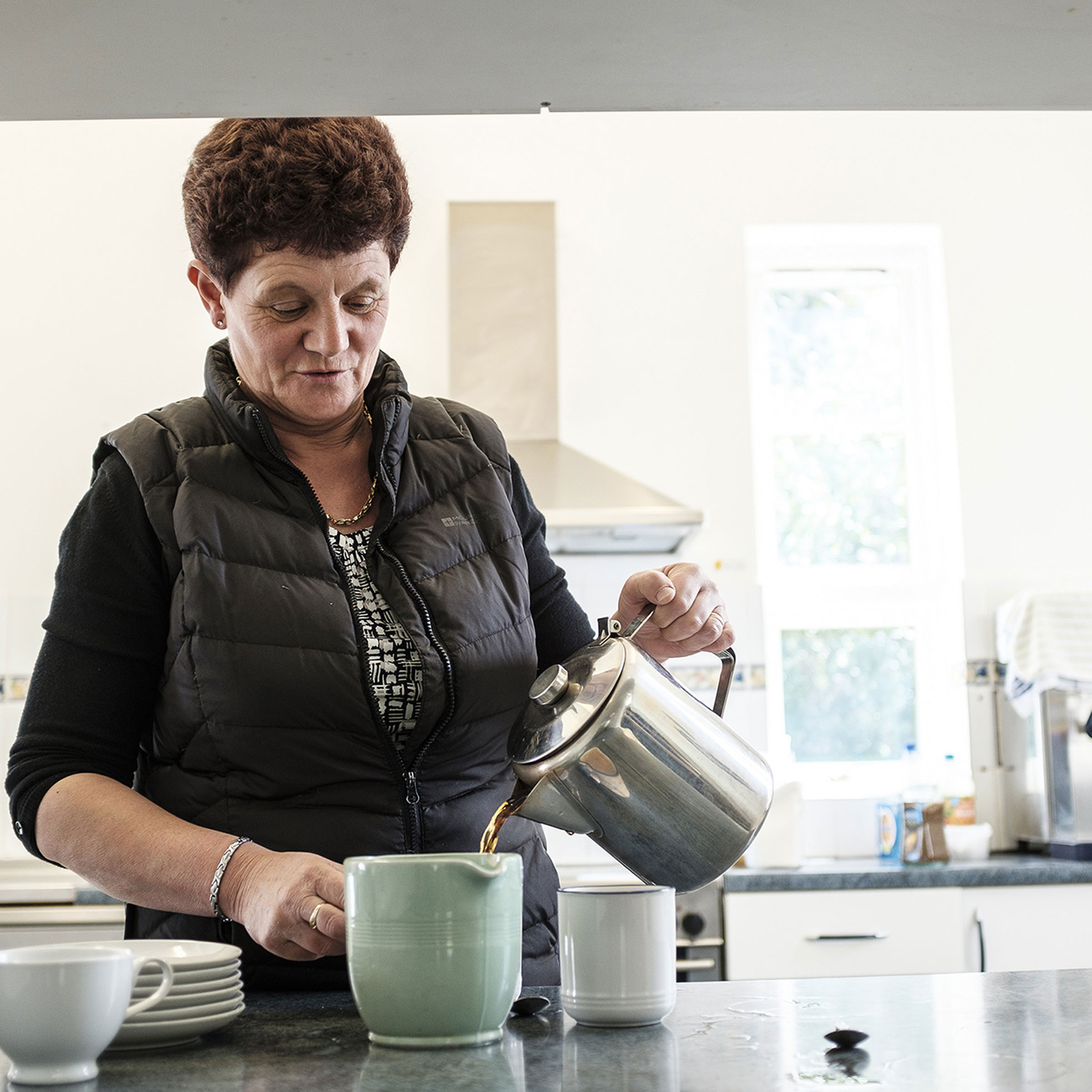 Lady pouring tea